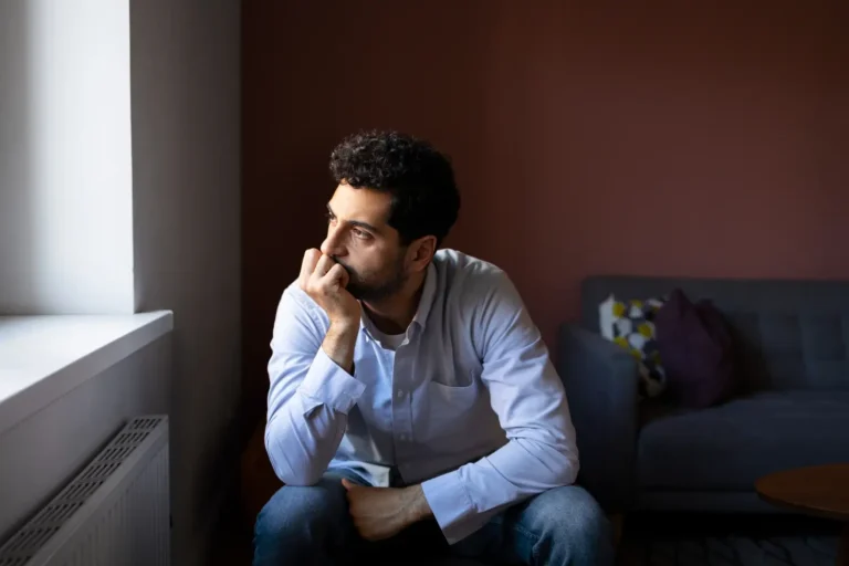 a man sitting on a chair-Men's Health Coaching & Fitness Training